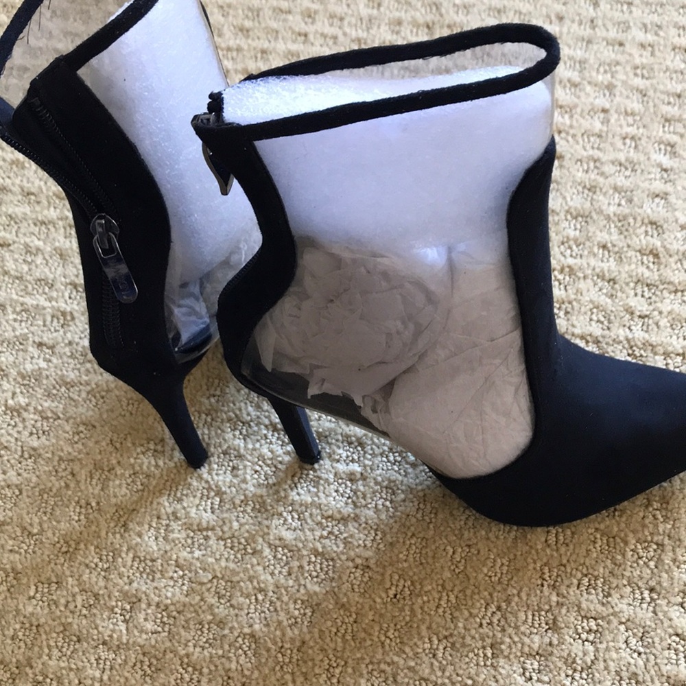 Super sexy clear and black Mackin stiletto healed boots.